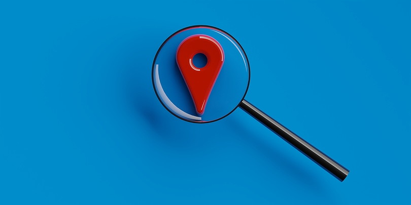 Magnifying Glass Over Location Marker