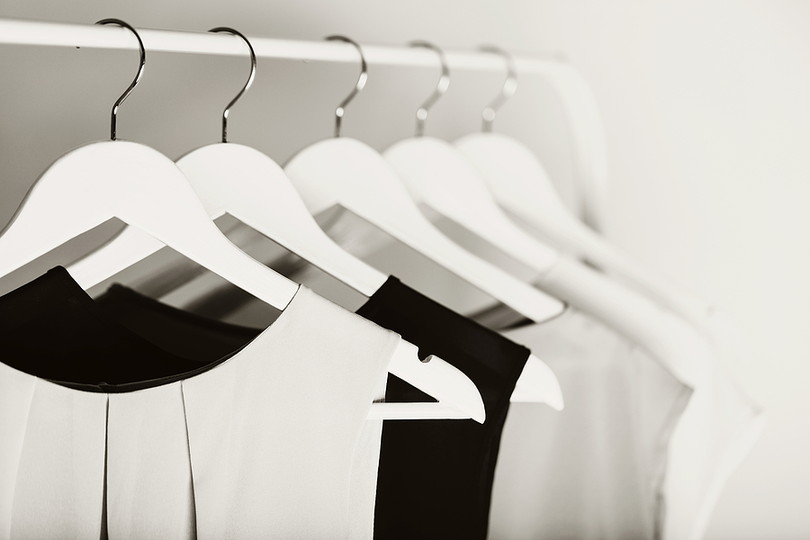 Black and White Clothes on Hangers
